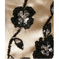 Avondjurk in zwart ivoorwit. Maat 38,40